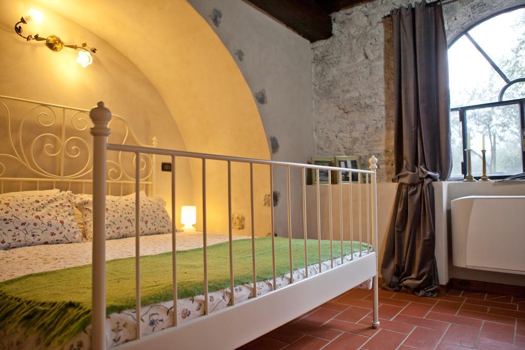 Castello Oldofredi Aparthotel Монте Изола Стая снимка